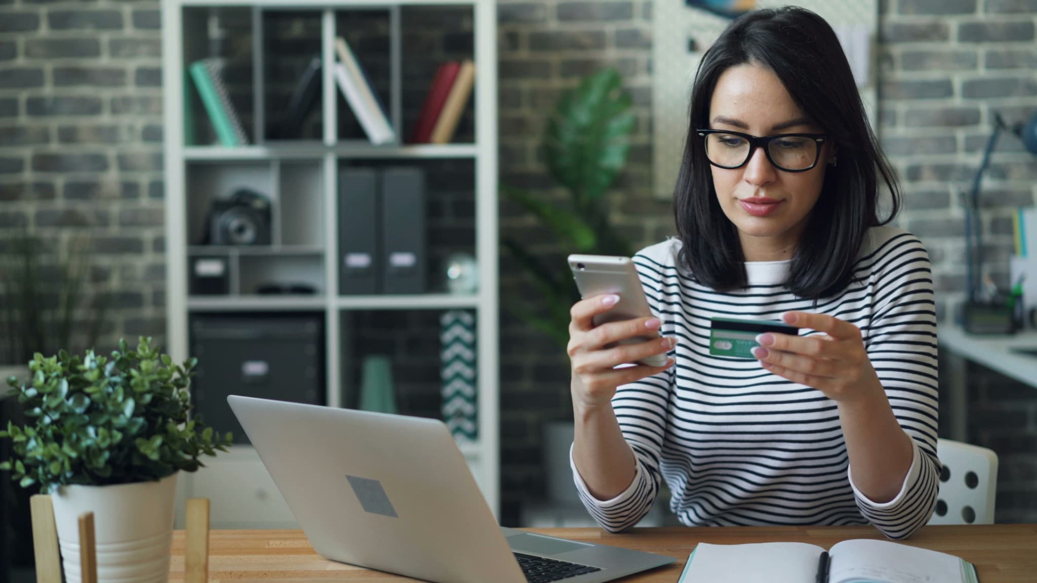 Founder reviewing financial information on a laptop
